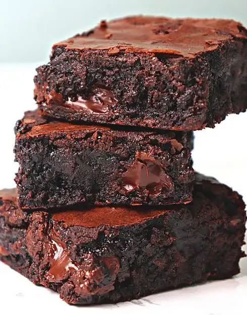 Rich and fudgy chocolate brownie topped with melted chocolate.